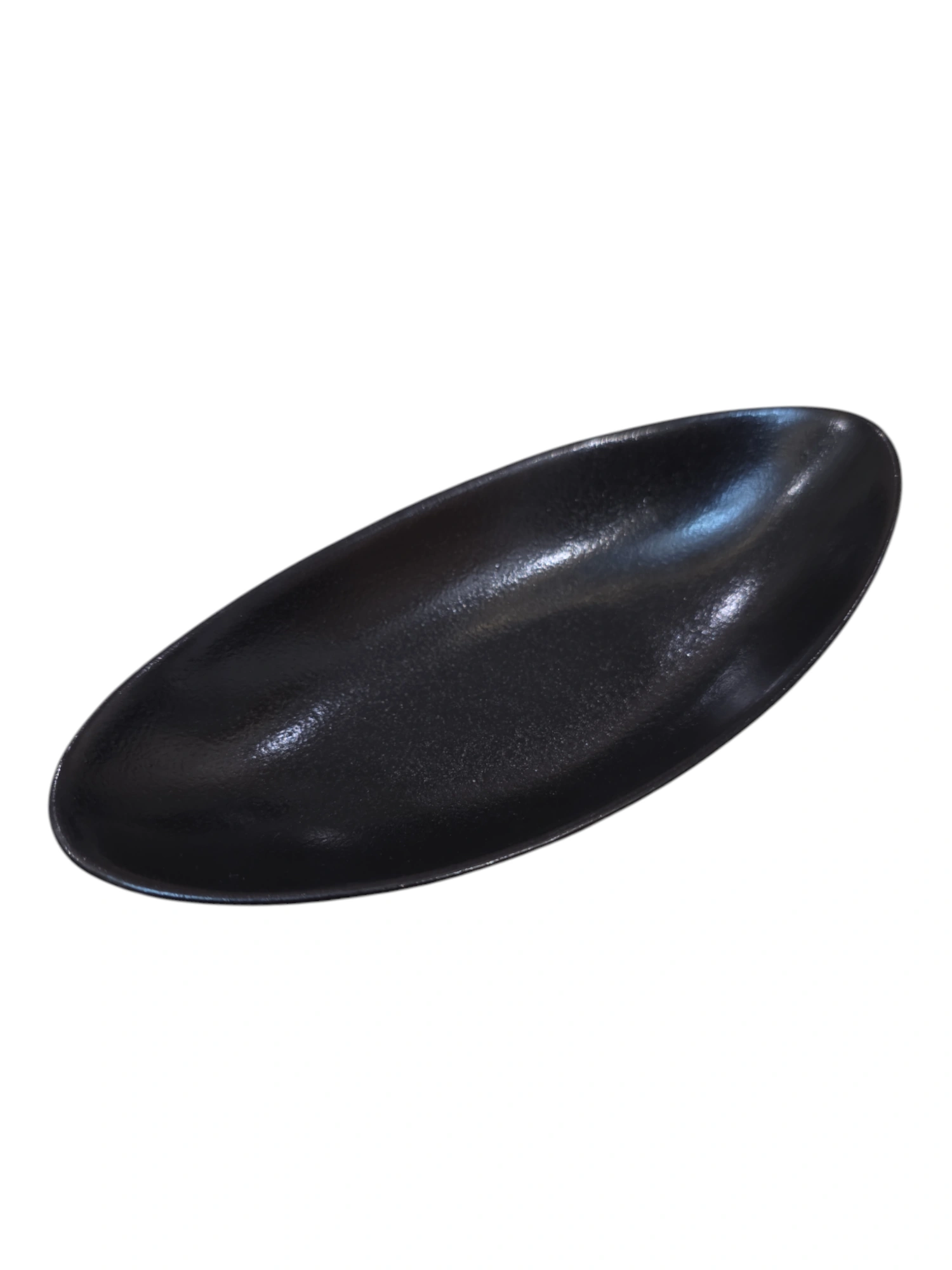 Plat ovale en céramique noire · 17,5 × 9 × 4 cm