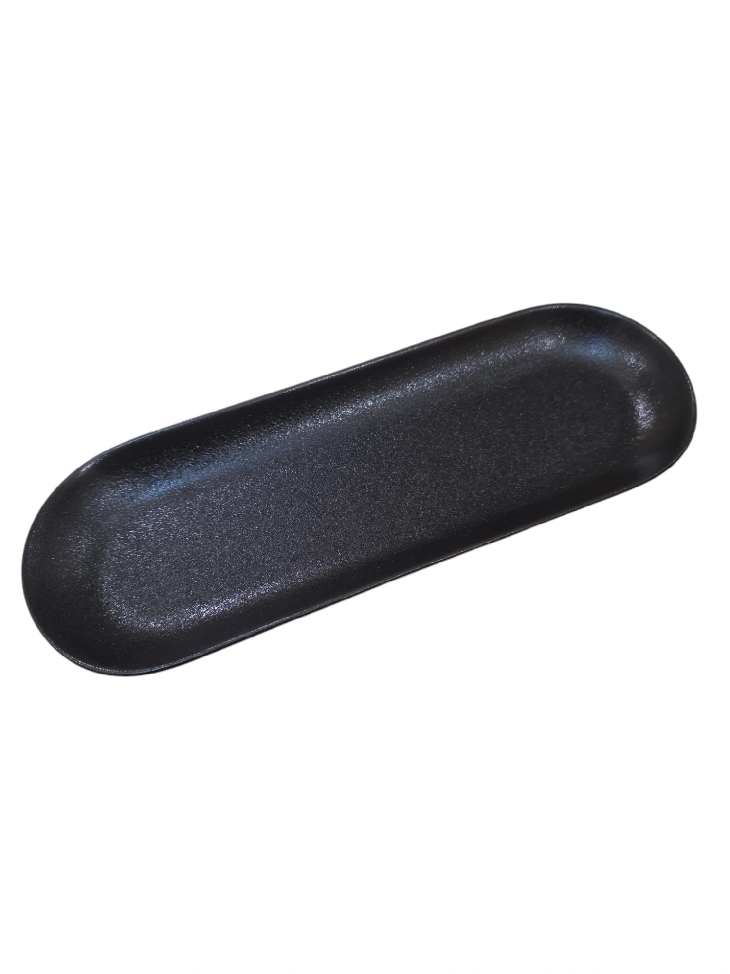 Plat ovale en céramique noire mate · 24,5 × 8,7 × 2 cm